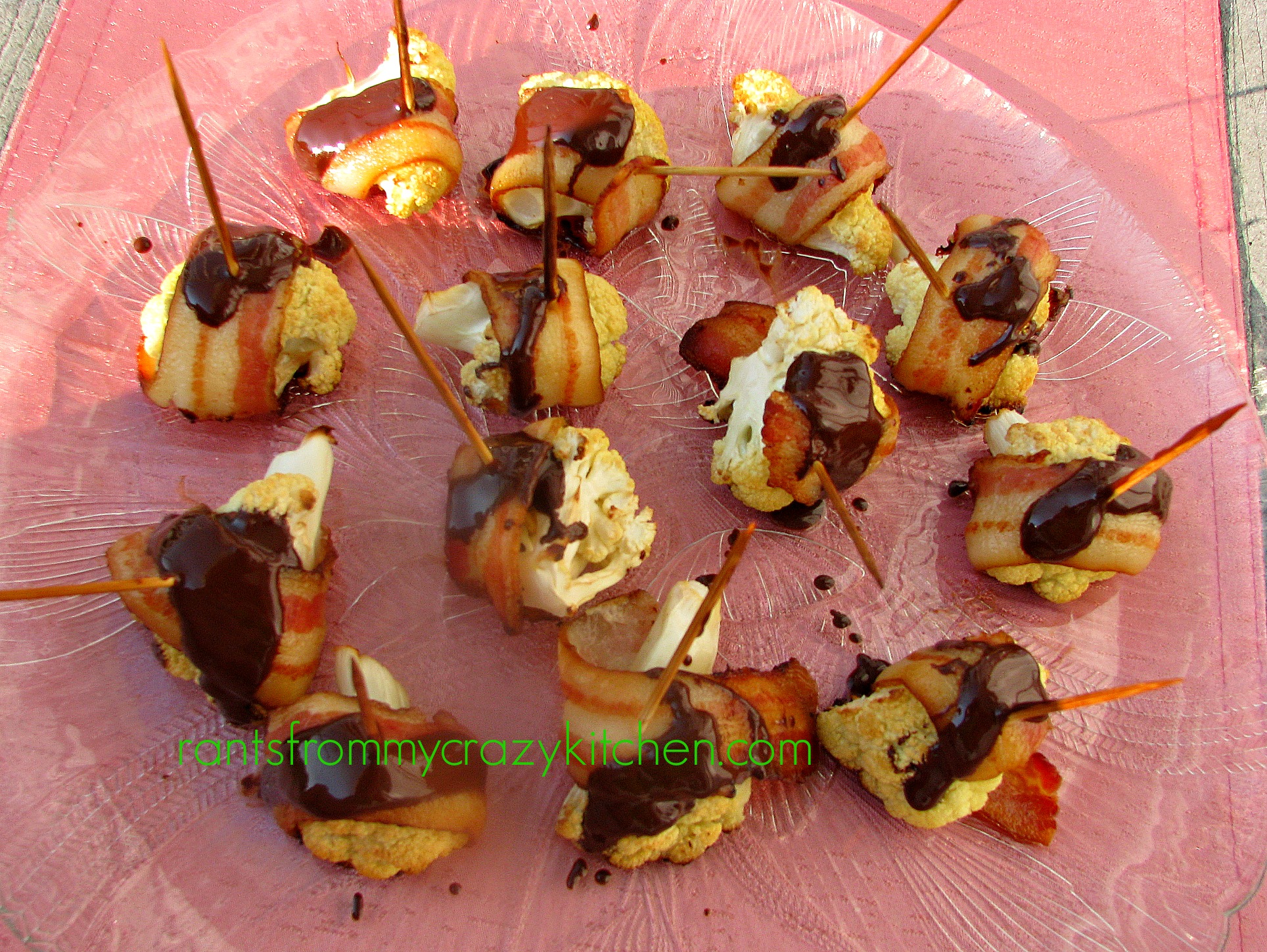 photo of Bacon Wrapped Cauliflower with Dark Chocolate on a glass platter
