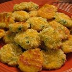 Photo of a full plate of Jalapeno Cheddar Bites on a dark orange plate