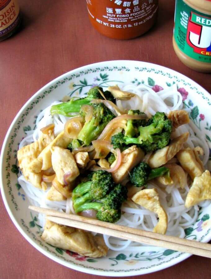 A quick and easy weeknight dinner, this Hoisin Chicken Stir-Fry is made with thin sliced chicken breast strips, broccoli, and onions in a delicious hoisin, peanut butter, and sriracha sauce.