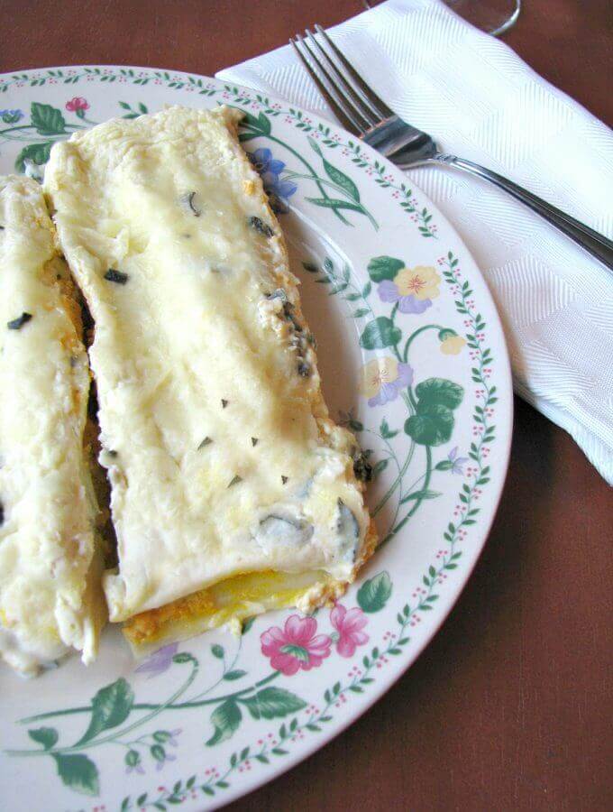 Cheesy, flavorful, and filling pumpkin manicotti with a delicious sage cream sauce.