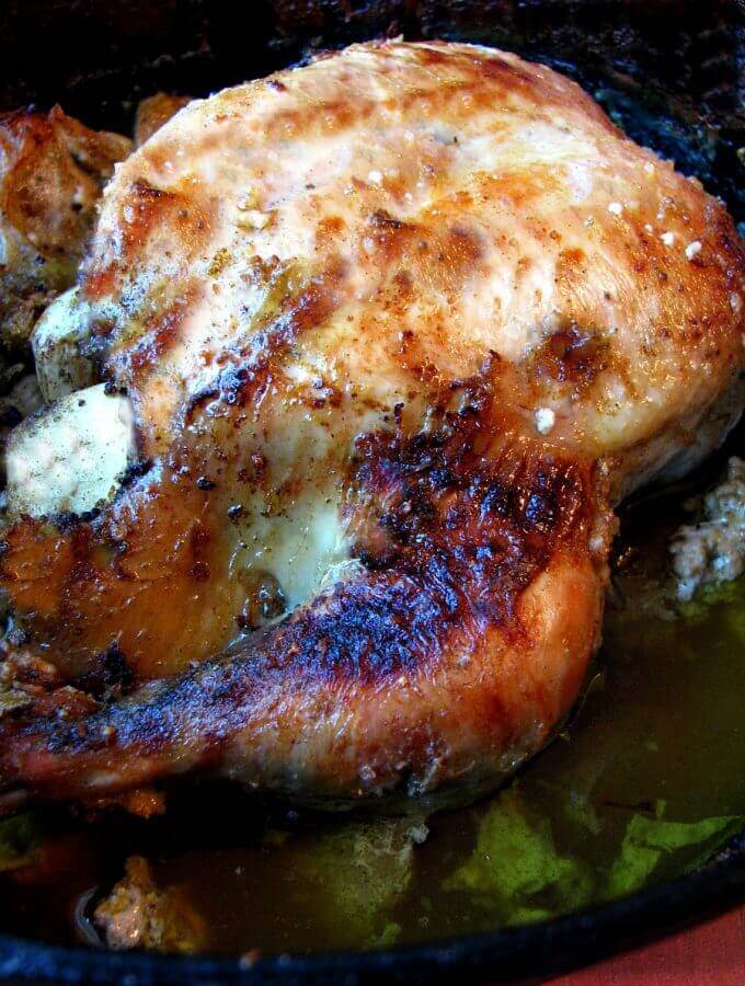 Chicken in Milk recipe adapted from Jamie Oliver- Chicken in Milk is a great change from traditional roasted chicken, and so easy to make. A whole chicken is braised in milk, along with lots of garlic and lemon, creating a fabulous sauce.