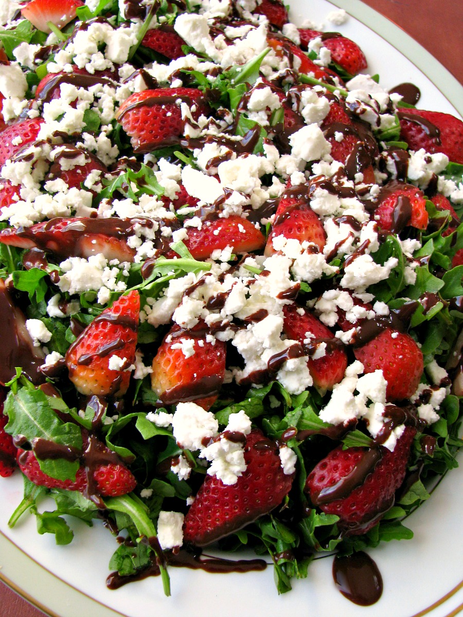 With crisp arugula, sweet strawberries, crumbled goat cheese, and a homemade chocolate balsamic vinaigrette, Arugula Strawberry Salad with Chocolate Vinaigrette is perfect for Easter dinner.