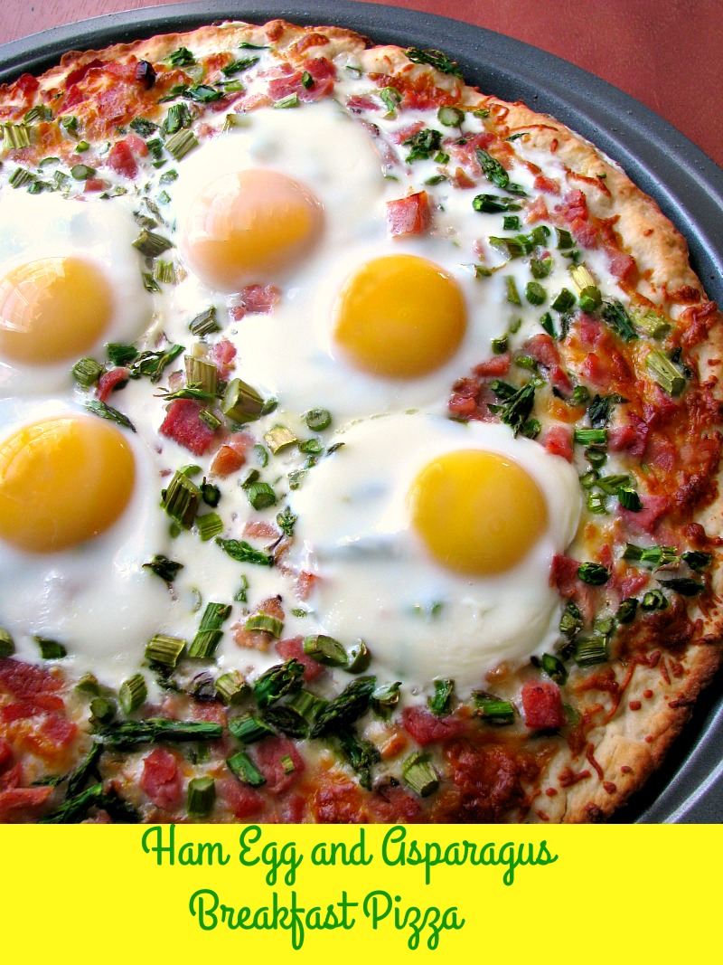 Cheesy Ham Egg and Asparagus Breakfast Pizza made with a homemade pizza crust is perfect for brunch!