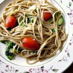 Light summertime vegetable Pasta Primavera, made with zucchini, spinach, asparagus, tomatoes, onions, and garlic, is a quick and easy dinner ready in less than 30 minutes.
