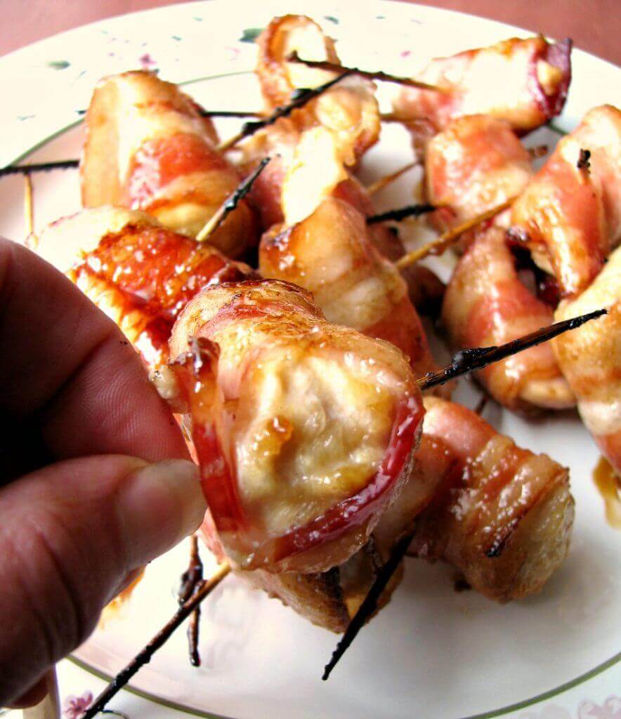 These sweet Brown Sugar Bacon Wrapped Chicken Bites are the perfect three-ingredient party appetizer. They keep well in a slow cooker set to keep warm, but they won't last!