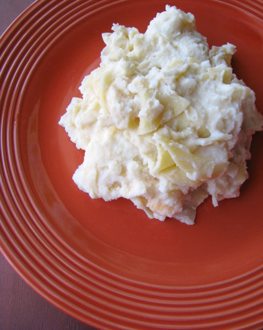 The ultimate comfort food, this American Pierogi Casserole is filled with mashed potatoes, egg noodles, onions, American and cheddar cheese, and butter.