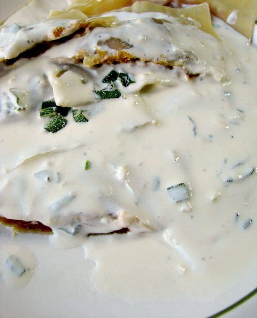 Homemade Pumpkin Ravioli with Parmesan Sage Cream Sauce is a restaurant quality main dish made easy with canned pumpkin puree and wonton wrappers. They taste like pumpkin pie filled pasta!