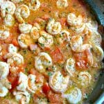 A delicious change from traditional shrimp scampi, Red Shrimp Scampi is made with lots of garlic, tomatoes, parsley, and black pepper in butter sauce. 