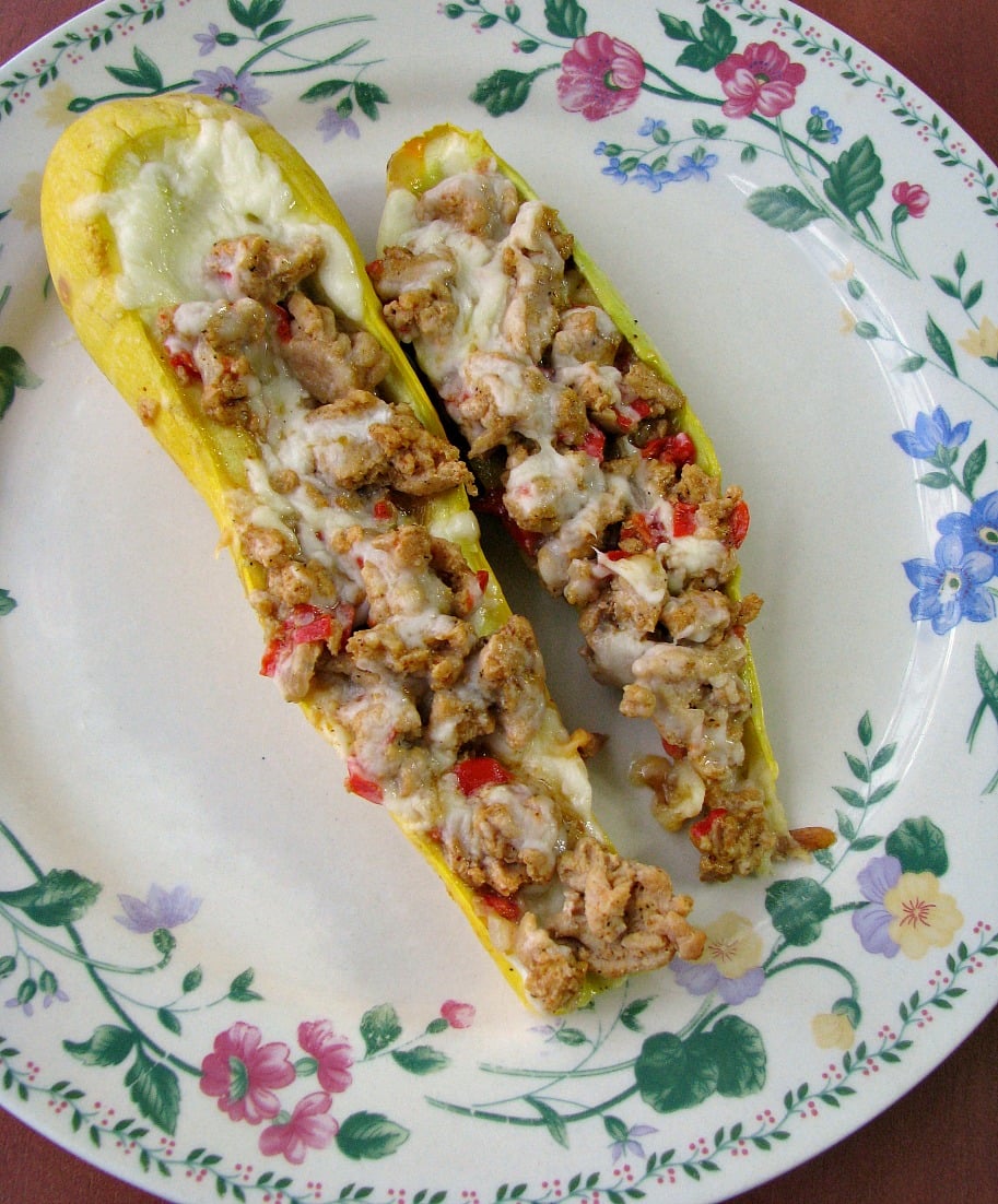Plated ground Chicken Fajita Stuffed yellow squash. 