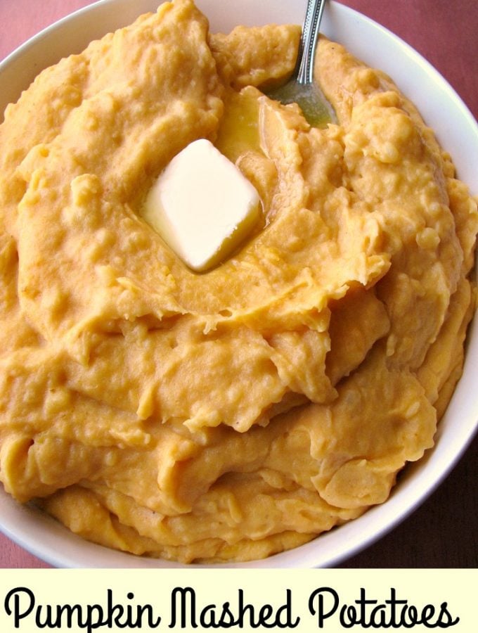Photo of Pumpkin Mashed Potatoes in a white bowl with a pat of butter melting on top