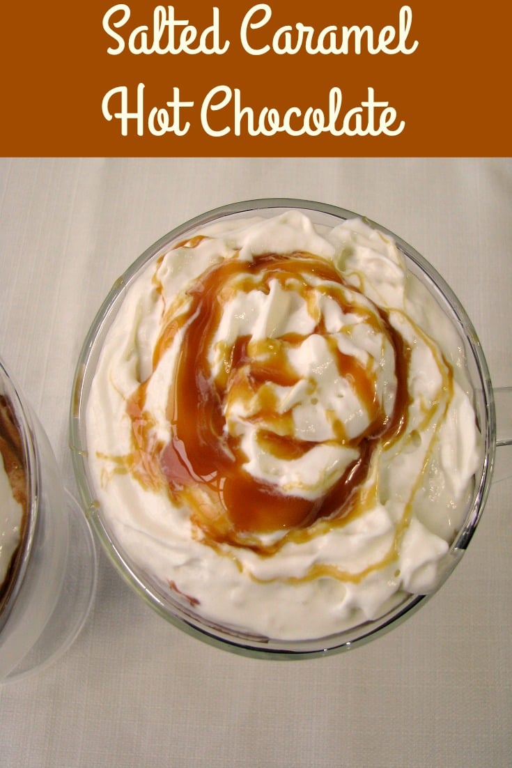 Overhead photo of Salted Caramel Hot Chocolate topped with whipped cream and caramel topping
