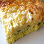 photo of a piece of chile relleno casserole on a small plate